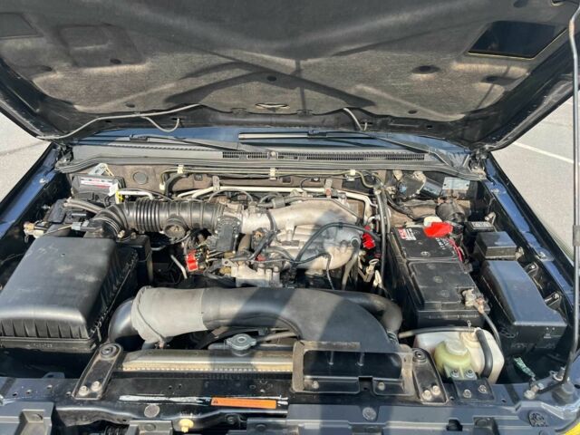 Чорний Міцубісі Паджеро, об'ємом двигуна 3 л та пробігом 219 тис. км за 11500 $, фото 12 на Automoto.ua