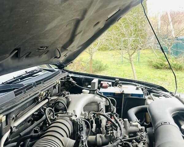 Чорний Міцубісі Паджеро, об'ємом двигуна 3 л та пробігом 260 тис. км за 10800 $, фото 55 на Automoto.ua