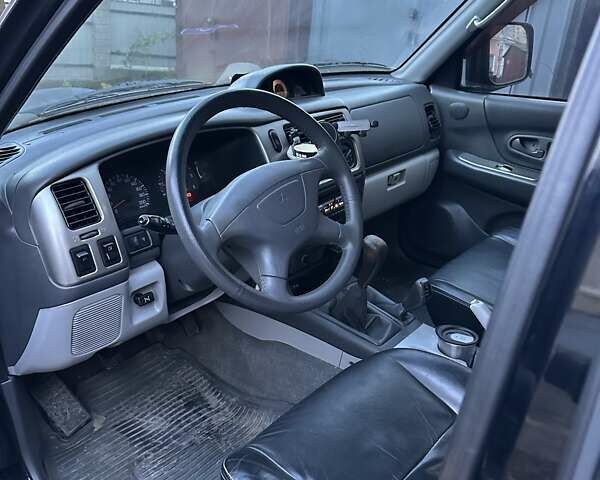 Чорний Міцубісі Паджеро, об'ємом двигуна 2.48 л та пробігом 104 тис. км за 8700 $, фото 6 на Automoto.ua