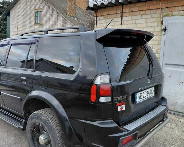 Черный Мицубиси Паджеро, объемом двигателя 2.48 л и пробегом 235 тыс. км за 12000 $, фото 5 на Automoto.ua