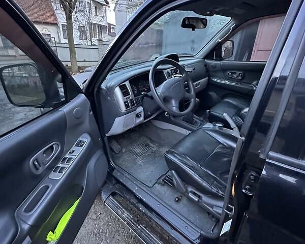 Чорний Міцубісі Паджеро, об'ємом двигуна 2.48 л та пробігом 104 тис. км за 8700 $, фото 3 на Automoto.ua