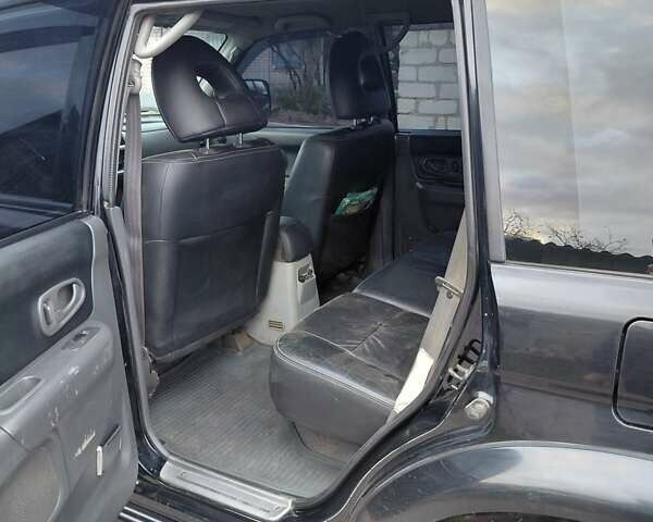 Черный Мицубиси Паджеро, объемом двигателя 2.48 л и пробегом 235 тыс. км за 12000 $, фото 2 на Automoto.ua