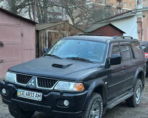 Чорний Міцубісі Паджеро, об'ємом двигуна 2.48 л та пробігом 104 тис. км за 8700 $, фото 1 на Automoto.ua