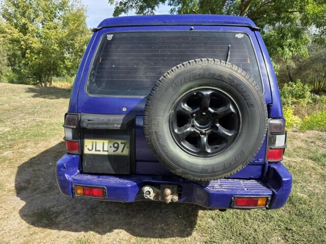 Фиолетовый Мицубиси Паджеро, объемом двигателя 2.8 л и пробегом 500 тыс. км за 4200 $, фото 2 на Automoto.ua