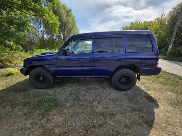 Фиолетовый Мицубиси Паджеро, объемом двигателя 2.8 л и пробегом 500 тыс. км за 4200 $, фото 3 на Automoto.ua