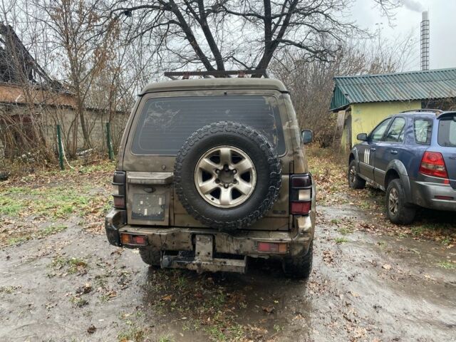 Коричневий Міцубісі Паджеро, об'ємом двигуна 3 л та пробігом 230 тис. км за 3000 $, фото 3 на Automoto.ua