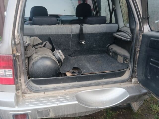 Коричневый Мицубиси Паджеро, объемом двигателя 1 л и пробегом 165 тыс. км за 2500 $, фото 2 на Automoto.ua