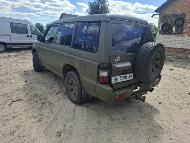 Червоний Міцубісі Паджеро, об'ємом двигуна 2.5 л та пробігом 400 тис. км за 3500 $, фото 3 на Automoto.ua