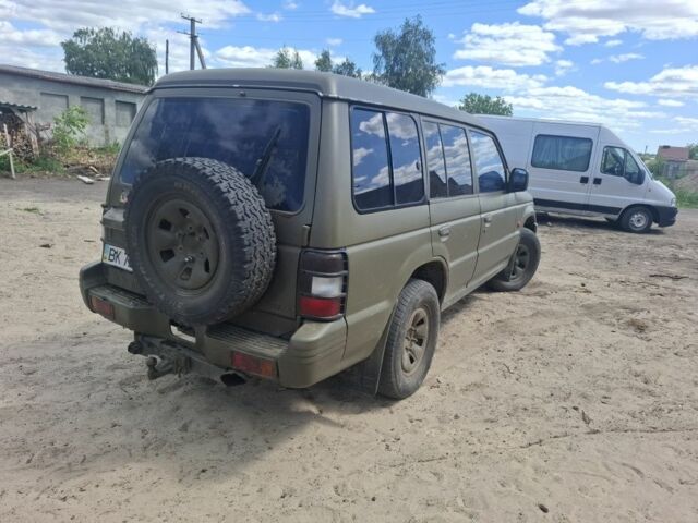 Червоний Міцубісі Паджеро, об'ємом двигуна 2.5 л та пробігом 400 тис. км за 3500 $, фото 4 на Automoto.ua