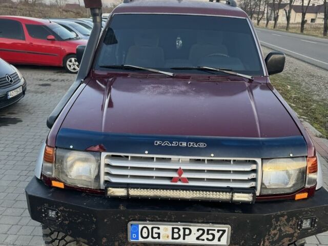 Красный Мицубиси Паджеро, объемом двигателя 2.5 л и пробегом 250 тыс. км за 5700 $, фото 1 на Automoto.ua