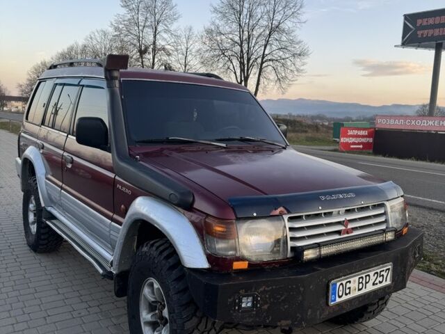 Красный Мицубиси Паджеро, объемом двигателя 2.5 л и пробегом 250 тыс. км за 5700 $, фото 14 на Automoto.ua