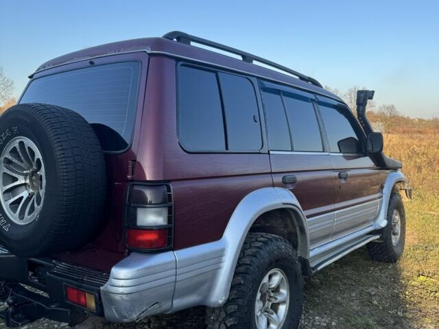 Красный Мицубиси Паджеро, объемом двигателя 2.5 л и пробегом 250 тыс. км за 5700 $, фото 16 на Automoto.ua