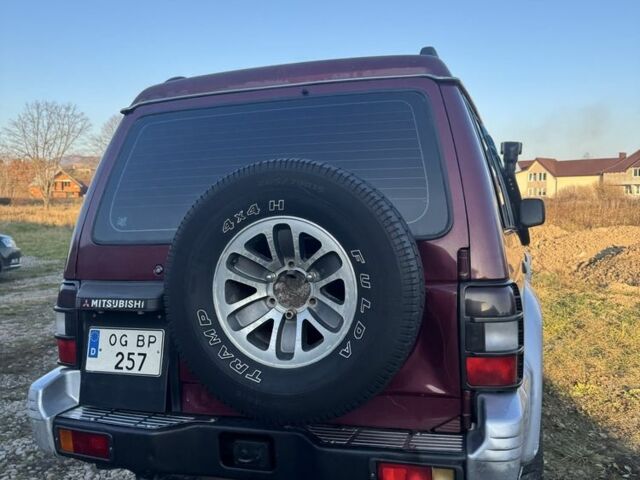 Красный Мицубиси Паджеро, объемом двигателя 2.5 л и пробегом 250 тыс. км за 5700 $, фото 18 на Automoto.ua