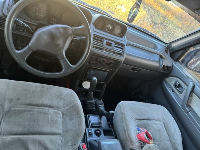 Красный Мицубиси Паджеро, объемом двигателя 2.5 л и пробегом 250 тыс. км за 5700 $, фото 19 на Automoto.ua