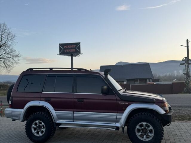 Красный Мицубиси Паджеро, объемом двигателя 2.5 л и пробегом 250 тыс. км за 5700 $, фото 2 на Automoto.ua