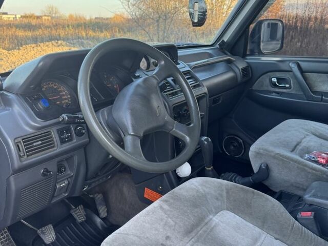 Красный Мицубиси Паджеро, объемом двигателя 2.5 л и пробегом 250 тыс. км за 5700 $, фото 21 на Automoto.ua