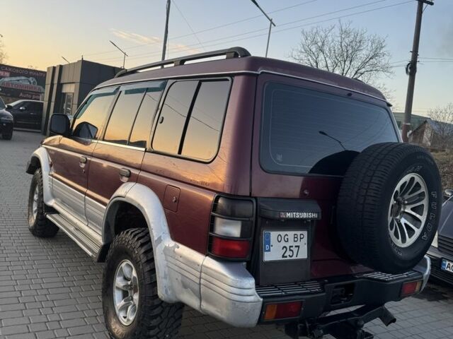 Красный Мицубиси Паджеро, объемом двигателя 2.5 л и пробегом 250 тыс. км за 5700 $, фото 11 на Automoto.ua