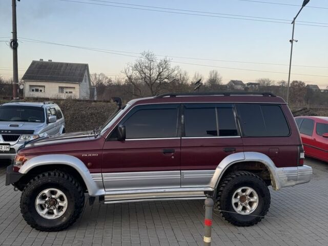 Красный Мицубиси Паджеро, объемом двигателя 2.5 л и пробегом 250 тыс. км за 5700 $, фото 3 на Automoto.ua