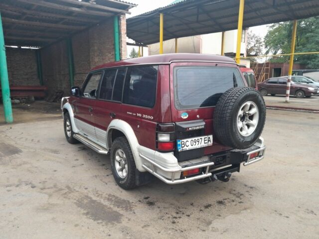 Красный Мицубиси Паджеро, объемом двигателя 3.5 л и пробегом 200 тыс. км за 4599 $, фото 2 на Automoto.ua