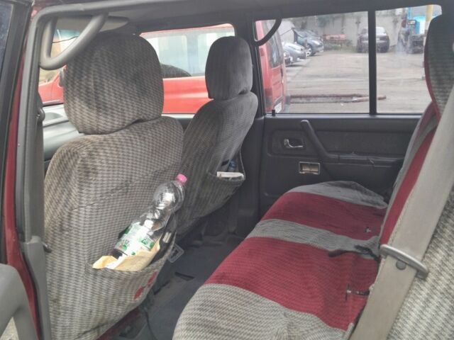 Красный Мицубиси Паджеро, объемом двигателя 3.5 л и пробегом 200 тыс. км за 4599 $, фото 5 на Automoto.ua