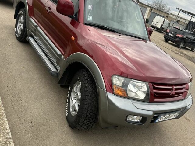 Красный Мицубиси Паджеро, объемом двигателя 3.5 л и пробегом 200 тыс. км за 8000 $, фото 4 на Automoto.ua