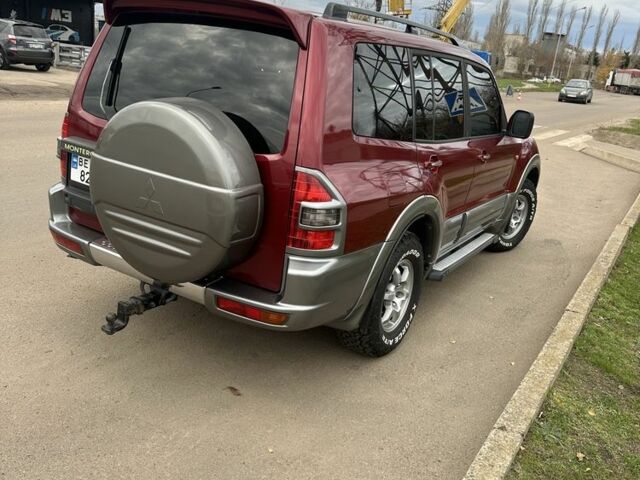 Красный Мицубиси Паджеро, объемом двигателя 3.5 л и пробегом 200 тыс. км за 8000 $, фото 5 на Automoto.ua