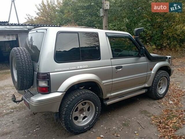 Сірий Міцубісі Паджеро, об'ємом двигуна 2.84 л та пробігом 360 тис. км за 10000 $, фото 3 на Automoto.ua