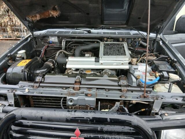 Сірий Міцубісі Паджеро, об'ємом двигуна 2.8 л та пробігом 300 тис. км за 4700 $, фото 9 на Automoto.ua