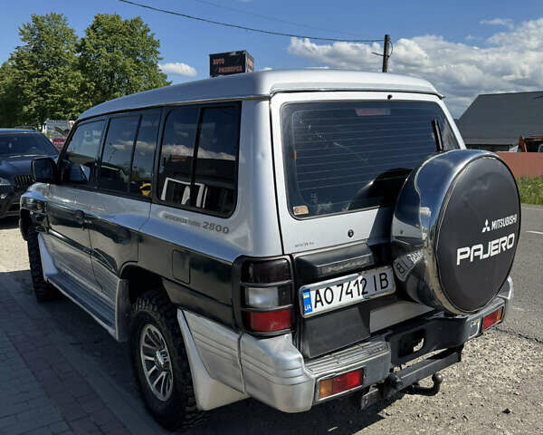 Сірий Міцубісі Паджеро, об'ємом двигуна 2.84 л та пробігом 366 тис. км за 9500 $, фото 6 на Automoto.ua