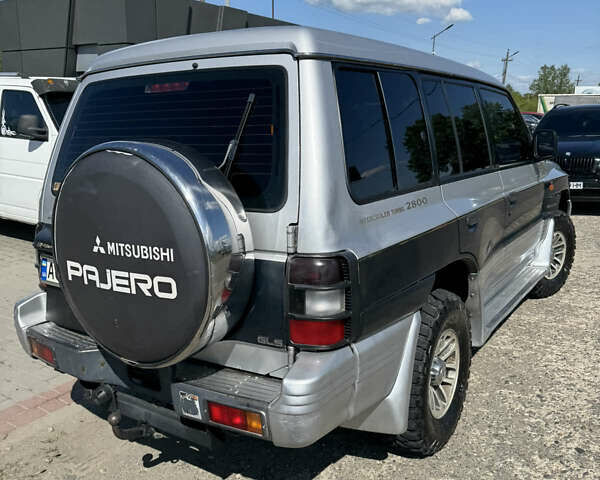 Сірий Міцубісі Паджеро, об'ємом двигуна 2.84 л та пробігом 366 тис. км за 9500 $, фото 4 на Automoto.ua