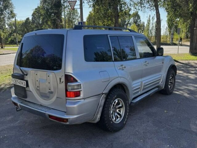 Серый Мицубиси Паджеро, объемом двигателя 3.2 л и пробегом 200 тыс. км за 3900 $, фото 1 на Automoto.ua