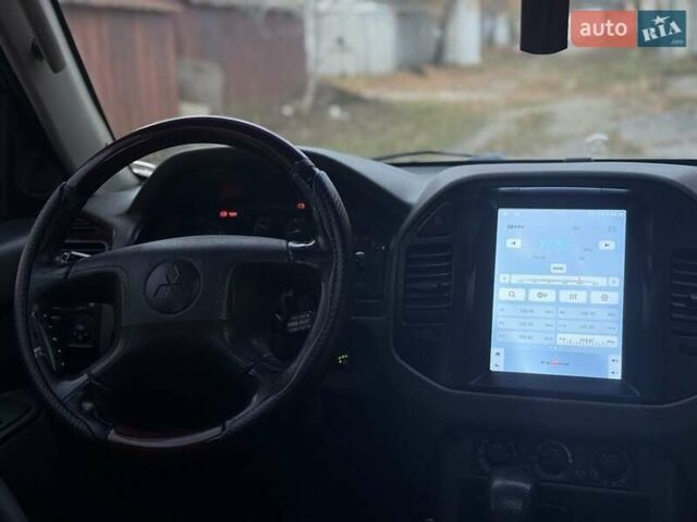 Серый Мицубиси Паджеро, объемом двигателя 3.5 л и пробегом 250 тыс. км за 6800 $, фото 6 на Automoto.ua