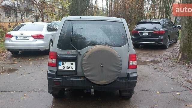 Серый Мицубиси Паджеро, объемом двигателя 1.8 л и пробегом 146 тыс. км за 4550 $, фото 3 на Automoto.ua