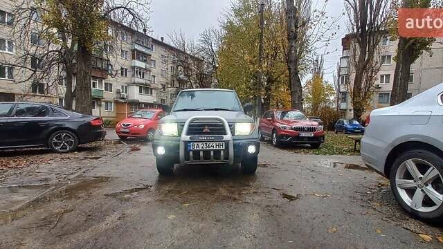 Серый Мицубиси Паджеро, объемом двигателя 1.8 л и пробегом 146 тыс. км за 4550 $, фото 18 на Automoto.ua