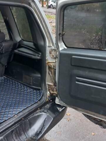 Серый Мицубиси Паджеро, объемом двигателя 1.8 л и пробегом 146 тыс. км за 4550 $, фото 5 на Automoto.ua