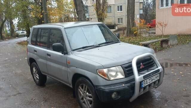Серый Мицубиси Паджеро, объемом двигателя 1.8 л и пробегом 146 тыс. км за 4550 $, фото 1 на Automoto.ua
