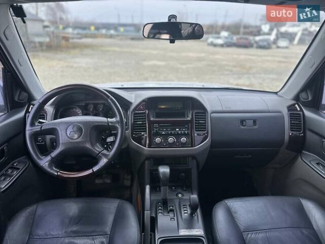 Серый Мицубиси Паджеро, объемом двигателя 3.5 л и пробегом 299 тыс. км за 6700 $, фото 56 на Automoto.ua