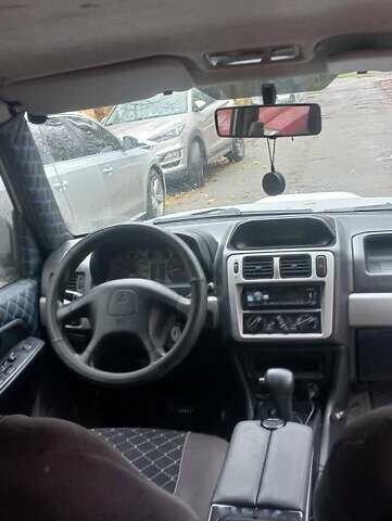 Серый Мицубиси Паджеро, объемом двигателя 1.8 л и пробегом 146 тыс. км за 4550 $, фото 10 на Automoto.ua