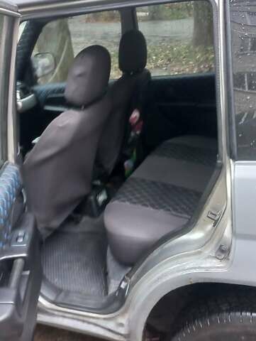 Серый Мицубиси Паджеро, объемом двигателя 1.8 л и пробегом 146 тыс. км за 4550 $, фото 7 на Automoto.ua