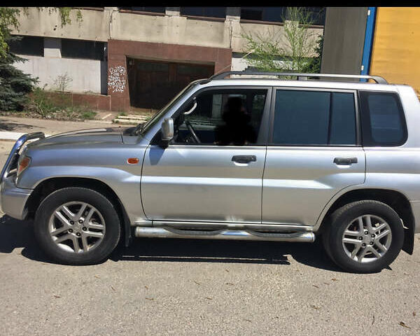 Серый Мицубиси Паджеро, объемом двигателя 1.8 л и пробегом 115 тыс. км за 6000 $, фото 9 на Automoto.ua