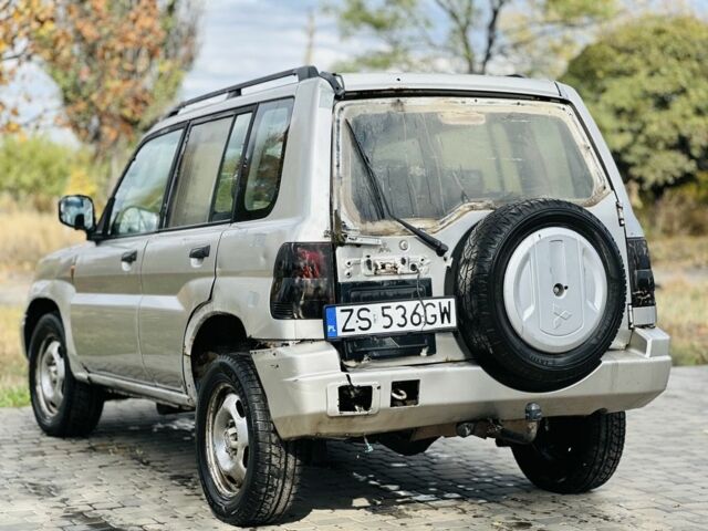 Серый Мицубиси Паджеро, объемом двигателя 1.8 л и пробегом 300 тыс. км за 1207 $, фото 3 на Automoto.ua