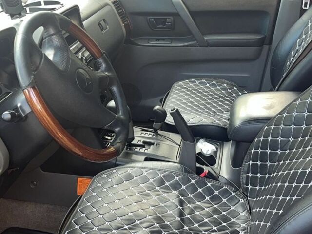 Серый Мицубиси Паджеро, объемом двигателя 3 л и пробегом 325 тыс. км за 4500 $, фото 4 на Automoto.ua