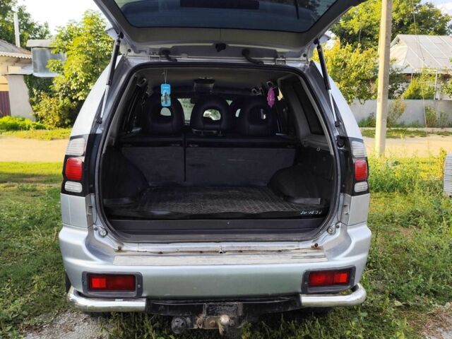 Серый Мицубиси Паджеро, объемом двигателя 2.5 л и пробегом 200 тыс. км за 10000 $, фото 5 на Automoto.ua