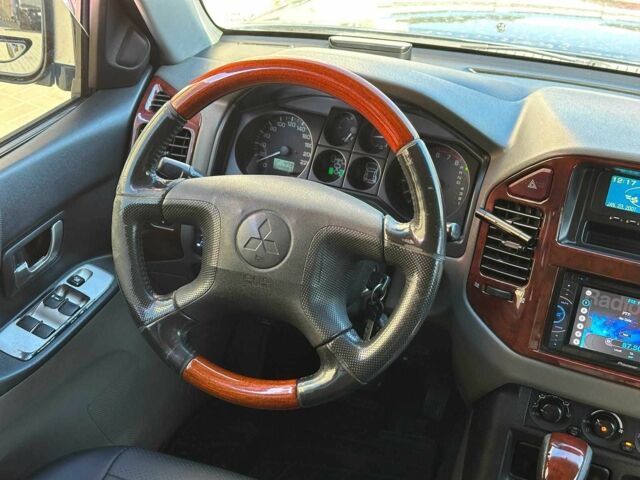 Сірий Міцубісі Паджеро, об'ємом двигуна 3 л та пробігом 230 тис. км за 6000 $, фото 21 на Automoto.ua