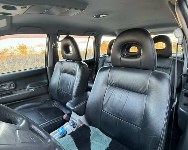 Міцубісі Паджеро 2006 у Хмельницькому на Automoto.ua Сірий Міцубісі Паджеро, об'ємом двигуна 3 л та пробігом 185 тис. км за 8000 $, фото 5 на Automoto.ua