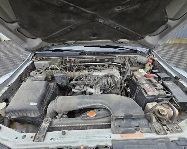 Серый Мицубиси Паджеро, объемом двигателя 2.97 л и пробегом 396 тыс. км за 7399 $, фото 27 на Automoto.ua