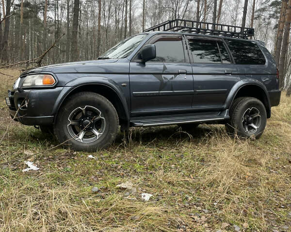 Серый Мицубиси Паджеро, объемом двигателя 3 л и пробегом 290 тыс. км за 9000 $, фото 5 на Automoto.ua