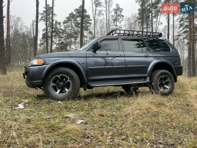 Серый Мицубиси Паджеро, объемом двигателя 3 л и пробегом 290 тыс. км за 9000 $, фото 6 на Automoto.ua
