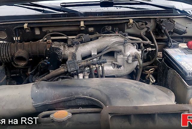 Серый Мицубиси Паджеро, объемом двигателя 3 л и пробегом 235 тыс. км за 11000 $, фото 3 на Automoto.ua