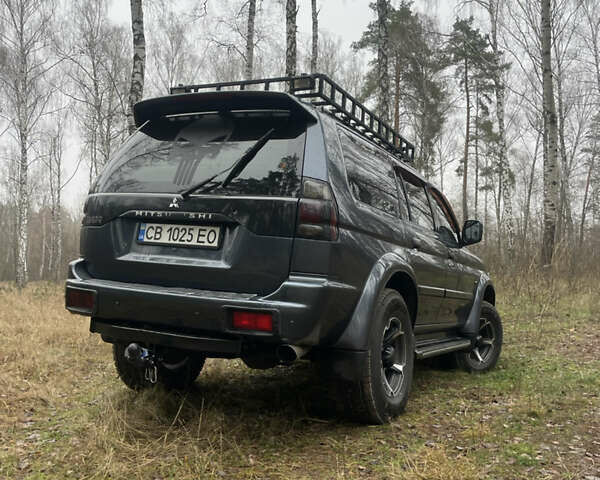 Серый Мицубиси Паджеро, объемом двигателя 3 л и пробегом 290 тыс. км за 9000 $, фото 3 на Automoto.ua
